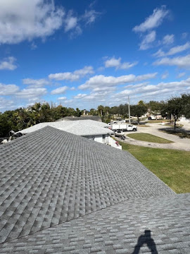 Dumaster Roofing — Finished gray architectural shingle roof overlooking the neighborhood