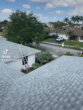 Dumaster Roofing — New architectural shingle roof with ladder access during final inspection