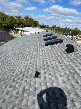 Dumaster Roofing — Shingle roof with new attic vents and boots installed